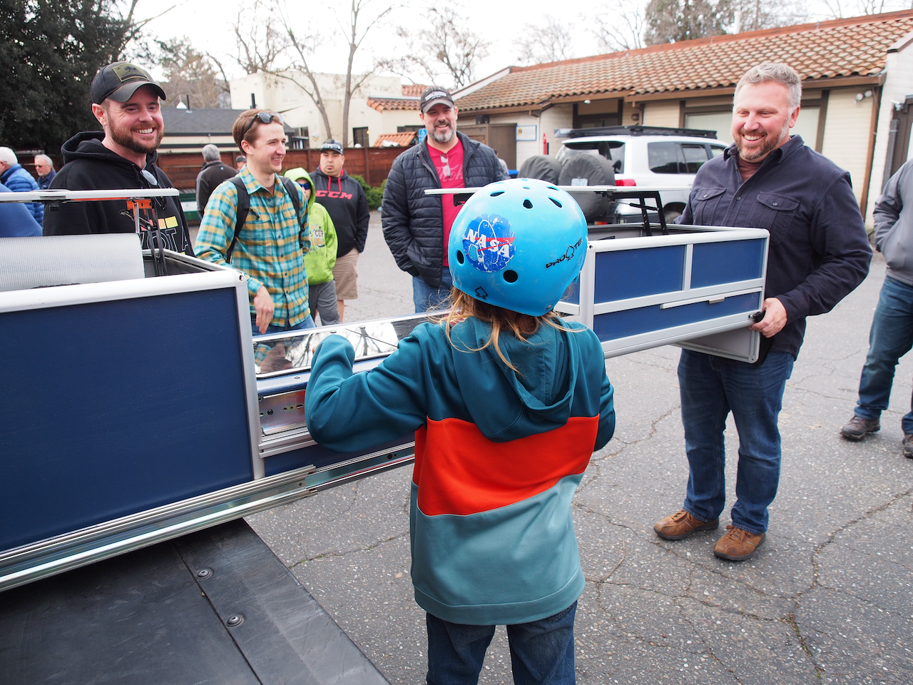 Dave Addington showing people his vehicle kitchen.